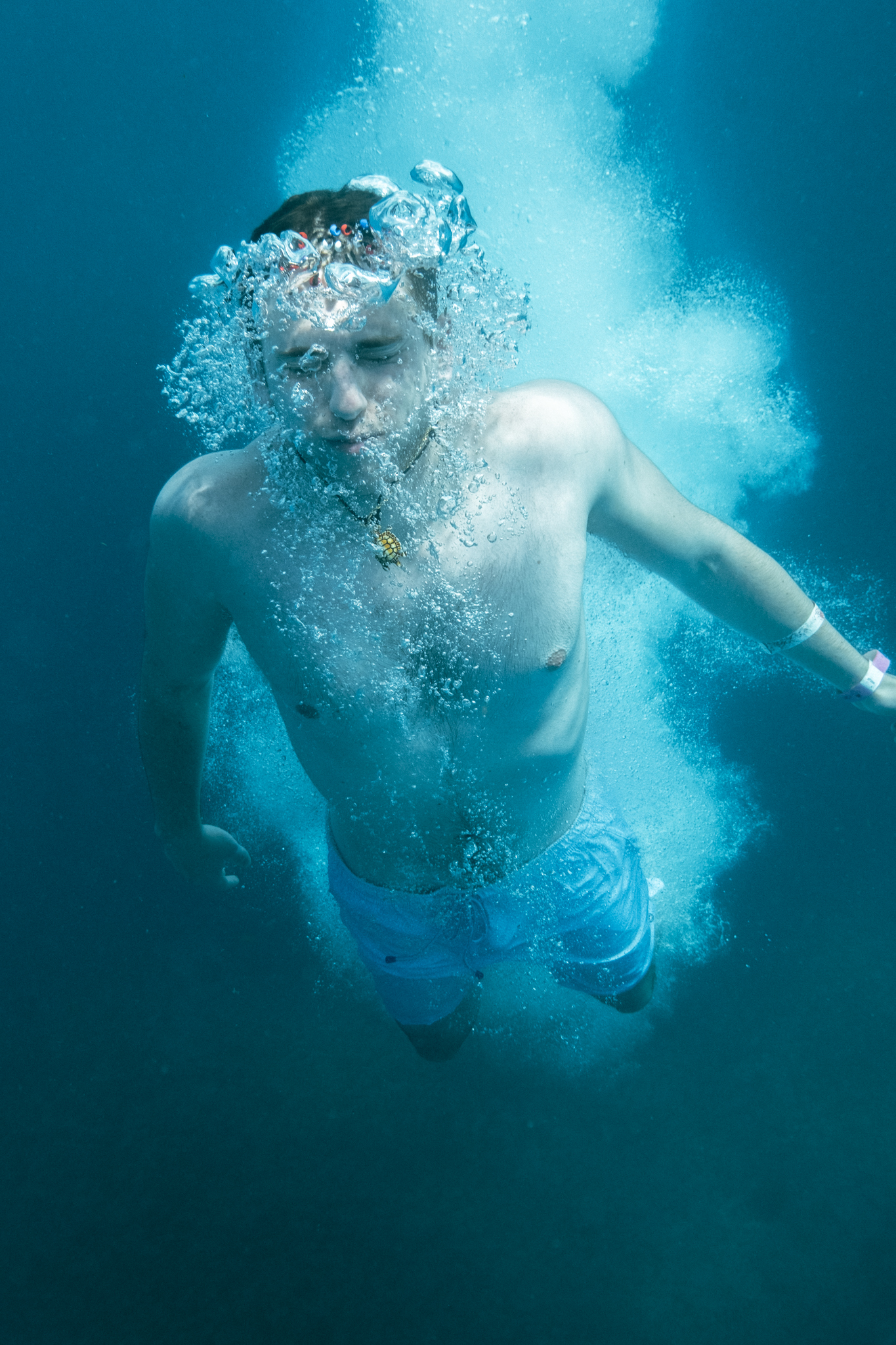 Guest underwater snorkeling in the crystal clear Caribbean waters off St. Maarten